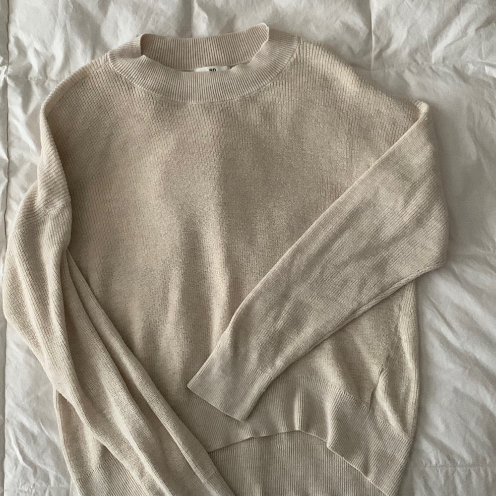 BP cream sweater
